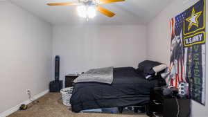 Bedroom featuring carpet flooring, ceiling fan, and baseboards