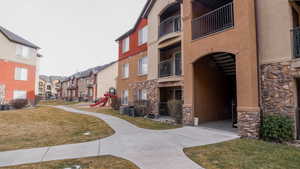 Surrounding community featuring a residential view and a yard