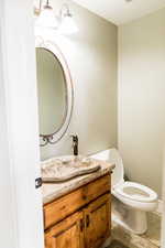 Bathroom with toilet and vanity