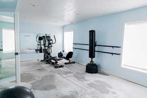 Exercise area featuring baseboards