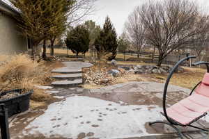 View of yard featuring a patio area and fence