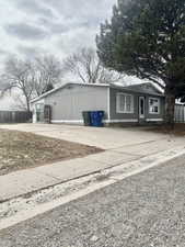 View of front of property with driveway