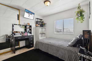 Bedroom with light wood-type flooring