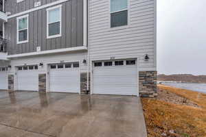 Garage with concrete driveway