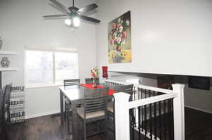 Dining space featuring baseboards and dark wood finished floors