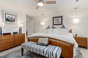 Bedroom featuring light carpet and a ceiling fan