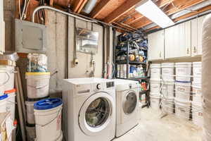 Laundry area with washing machine and dryer, laundry area, and electric panel