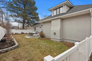 View of yard with a patio area and a fenced backyard