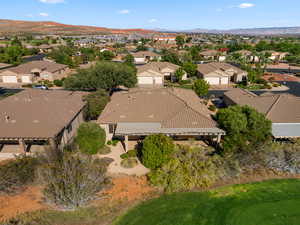 Aerial view of residential area with a mountain backdrop