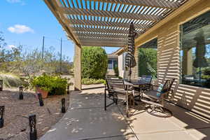 View of patio / terrace featuring outdoor dining space and a pergola