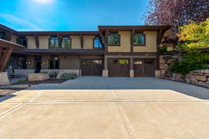 View of front facade featuring a garage