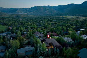 Birds eye view of property featuring a mountain view