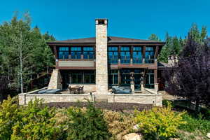 Rear view of house featuring a patio area