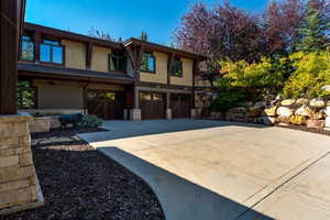 View of front facade featuring a garage