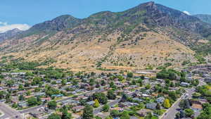 Birds eye view of property featuring a residential view and a mountain view
