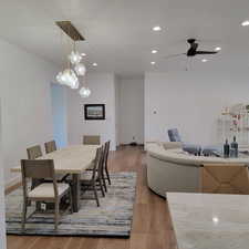 Dining room featuring a ceiling fan and hardwood/wood floors