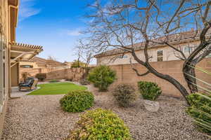 View of yard featuring a patio area, a fenced backyard, and a pergola