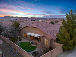 Birds eye view of property with a residential view and a mountain view