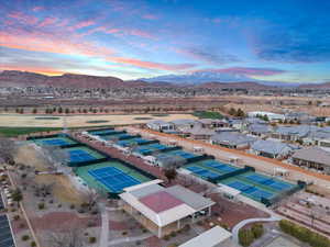 Aerial view at dusk with a residential view and a mountain view