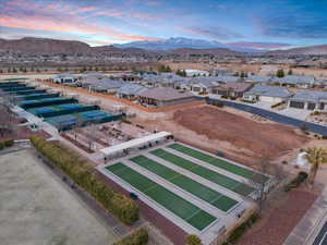 Aerial view at dusk featuring a residential view and a mountain view