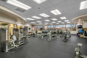 Gym featuring a paneled ceiling