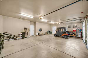 Garage featuring a garage door opener