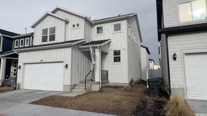 View of front of home with a garage