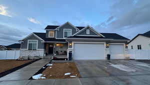 View of front of home featuring a garage