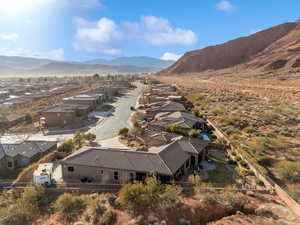 Birds eye view of property featuring a residential view and a mountain view