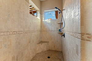 Bathroom with a tile shower