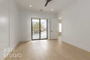 Empty room with recessed lighting, baseboards, visible vents, and light wood finished floors