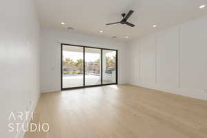 Spare room with ceiling fan, recessed lighting, light wood-type flooring, and a decorative wall