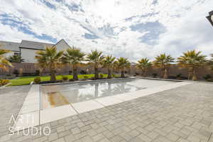 View of pool with fence