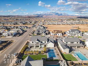 Drone / aerial view featuring a residential view and a mountain view