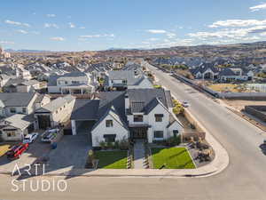 Drone / aerial view featuring a residential view and a mountain view