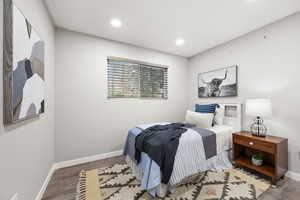 Bedroom featuring recessed lighting, LVP Flooring