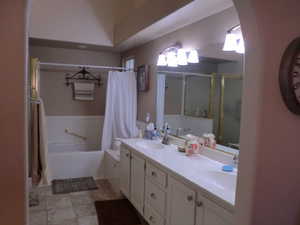 Bathroom featuring vanity and tile patterned flooring