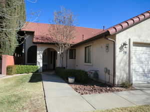 View of front of home featuring a garage