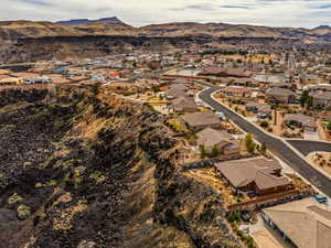 Birds eye view of property with a residential view and a mountain view