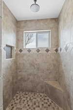 Bathroom with tiled shower