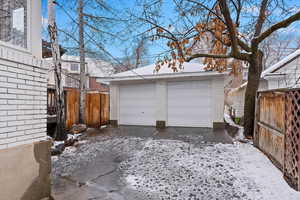 2 car detached garage with back alley access