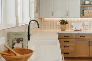 Kitchen with brown cabinetry