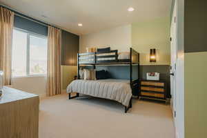 Bedroom featuring light carpet, baseboards, visible vents, a mountain view, and recessed lighting