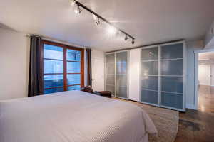 Bedroom with a textured ceiling