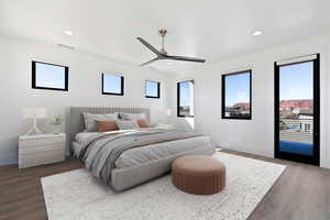 Bedroom featuring access to outside, dark wood-type flooring, multiple windows, and recessed lighting