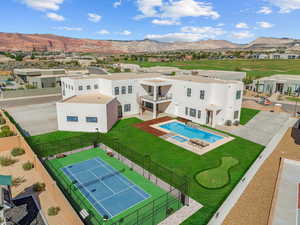 Birds eye view of property featuring a residential view and a mountain view