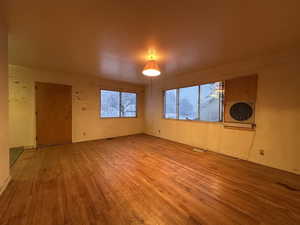 Empty room featuring light wood-style flooring and baseboards