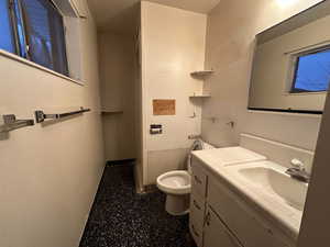 Bathroom with vanity and toilet