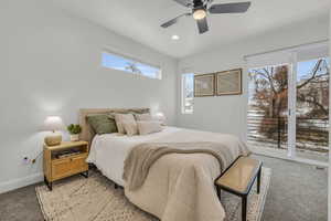 Carpeted bedroom with ceiling fan, recessed lighting, visible vents, baseboards, and access to exterior