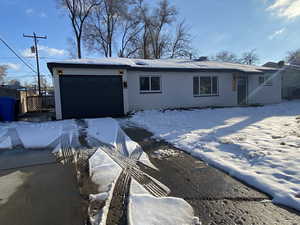 View of front of home featuring an attached garage